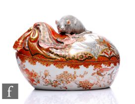 A Meji period Japanese Kutani lidded ‘Rat’ dish, decorated with Daoist immortal and surmounted