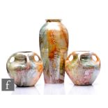 A pair of 1920s Arabia of Finland Art Deco vases, each of low shouldered form with four drawn