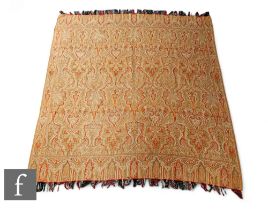 An early 20th Century paisley shawl in traditional pattern and design, 165cm x 162cm.