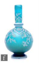 A late 19th Century Stevens & Williams cameo glass vase of footed globe and shaft form, cased in