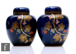 A pair of late 1930s Carlton Ware ginger jars and covers decorated in the Grape Vine pattern with