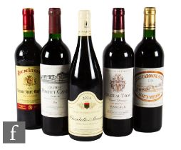 A collection of French red wines, to include  Chateau Pontet-Canet Pauillac 2001, Chateau Caronne