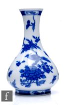 A late 19th to early 20th Century French Limoges bottle vase in the Chinese taste by Bernardaud &