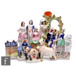 An assorted collection of 19th Century Staffordshire flat back figures to include an arbor group