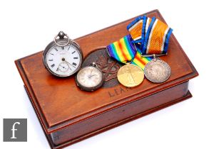 A World War One medal pair to 5998 Pte J. G. Strong South Staffs, with a silver pocket and fob