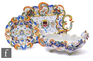 A large late 19th Century French Faience table centre bowl by Gabriel Fourmaintraux of fluted oval