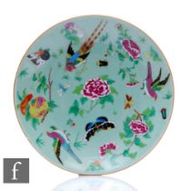 A 19th Century Chinese export ware plate, shallow dish form, the body decorated in the Famille