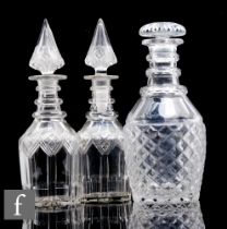 A late Georgian Prussian form decanter with strawberry diamond and slice cut detail below a three