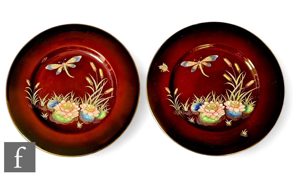 A pair of late 1930s Carlton Ware shallow circular plates, decorated in the Dragon Fly pattern