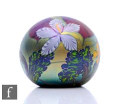 A contemporary Richard P. Golding glass paperweight, of domed form, decorated to the surface with