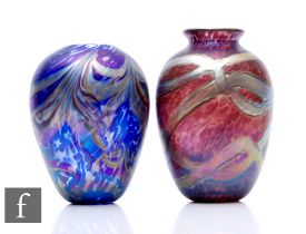 A contemporary Richard P. Golding glass vase, of ovoid form with everted rim, decorated with large