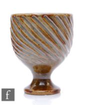 A later 20th Century Ayelsford Pottery chalice of footed ovoid form, the body decorated with