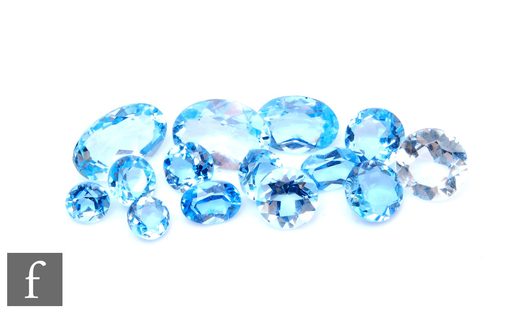 Fourteen assorted loose cut and polished aquamarine stones to include oval and round examples,