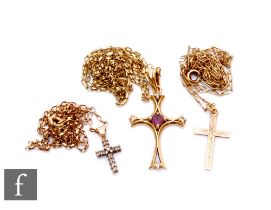 Three 9ct crosses and chains to include a diamond example and an amethyst set example, total