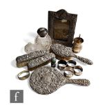 A parcel lot of assorted hallmarked silver and other items to include napkin rings, a scent