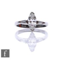 A platinum diamond solitaire ring, marquise claw set stone, weight approximately 0.85ct, colour I/J,