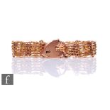 A 9ct rose gold six bar fancy link gate bracelet weight 24g, terminating in padlock fastener.
