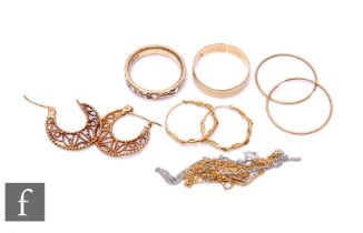 A small parcel lot of assorted 9ct jewellery to include wedding rings, earrings etc, weight 10.5g,