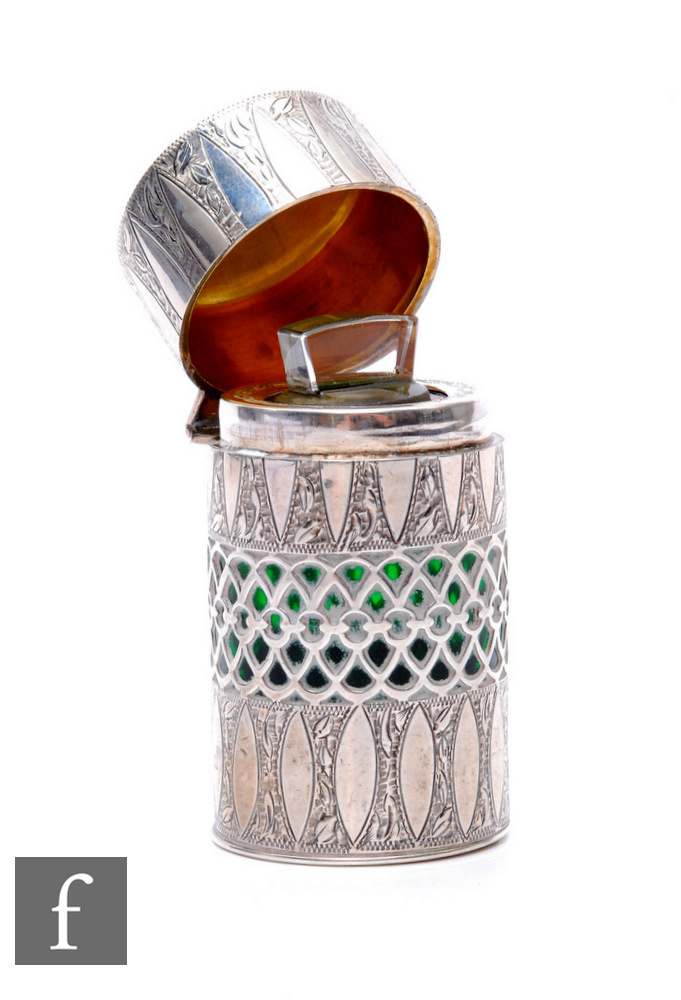 A hallmarked silver cylindrical scent bottle in the aesthetic taste with pierced and engraved