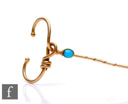 An early 20th Century 15ct cravat pin set with a single turquoise, weight 3.5g, length 7cm,