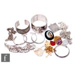 A small parcel lot of assorted jewellery to include hallmarked silver chains, bangles and