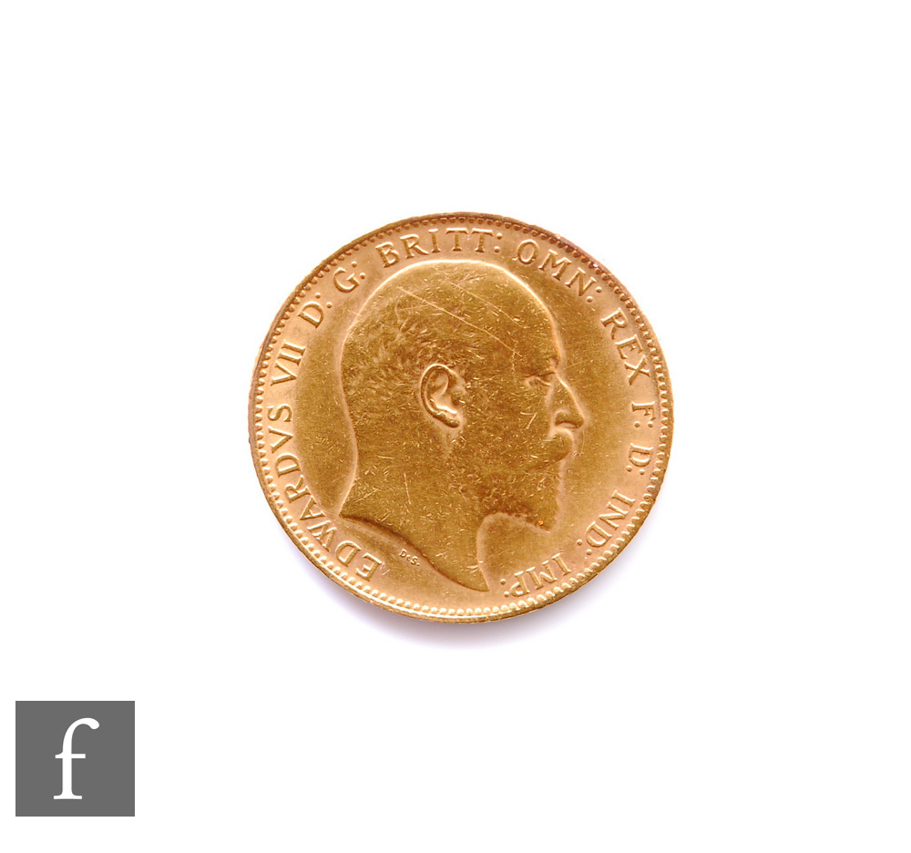 An Edward VII full sovereign dated 1903.