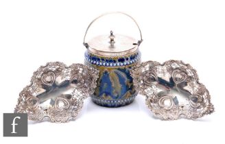 A pair of hallmarked silver shaped oval bon bon dishes, each with pierced decoration and raised on
