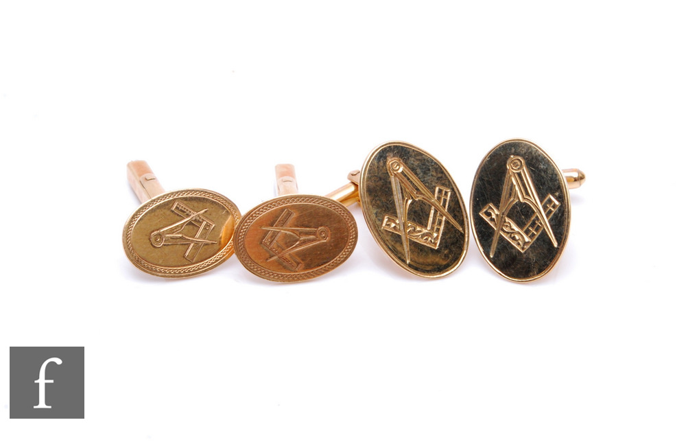 Two pairs of 9ct Masonic swivel cufflinks each with set square and compass engraved to an oval head,