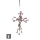 A 9ct hallmarked white gold diamond set cross detailed with twenty five individually set stones,