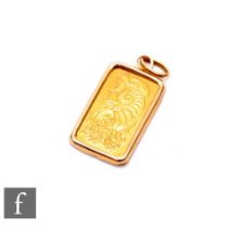 A 24ct gold ingot, weight 5g, loose to an 18ct pendant mount, total weight 6.3g.