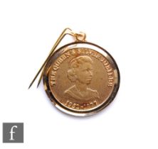 A 22ct hallmarked Elizabeth II Silver Jubilee pendant, weight 11.5g, diameter 26mm, boxed.