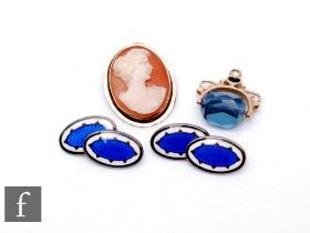 An 18ct mounted cameo brooch, weight 4g, with a 9ct stone set swivel fob, weight 4g, and a pair of