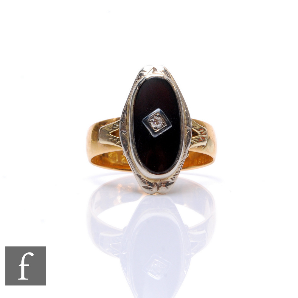 A 22ct wedding ring with applied oval onyx with central single stone diamond, weight 5.9g, ring size