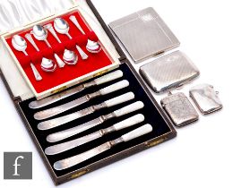 A small parcel lot of hallmarked silver items, two cigarette cases and two vesta cases with a