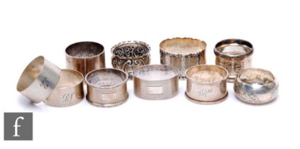 Ten assorted hallmarked silver napkin rings to include oval and circular embossed examples, total