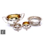 Four items of hallmarked silver to include a sugar basin, a small bowl and two open salts, total