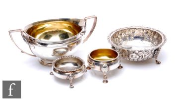 Four items of hallmarked silver to include a sugar basin, a small bowl and two open salts, total