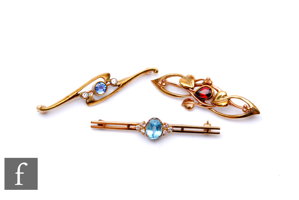 Three modern 9ct stone set bar brooches to include a sapphire and diamond three stone example, total