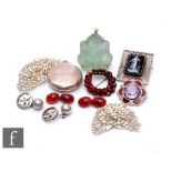 A small parcel lot of silver and other items to include chains, cufflinks, a carved glass study of