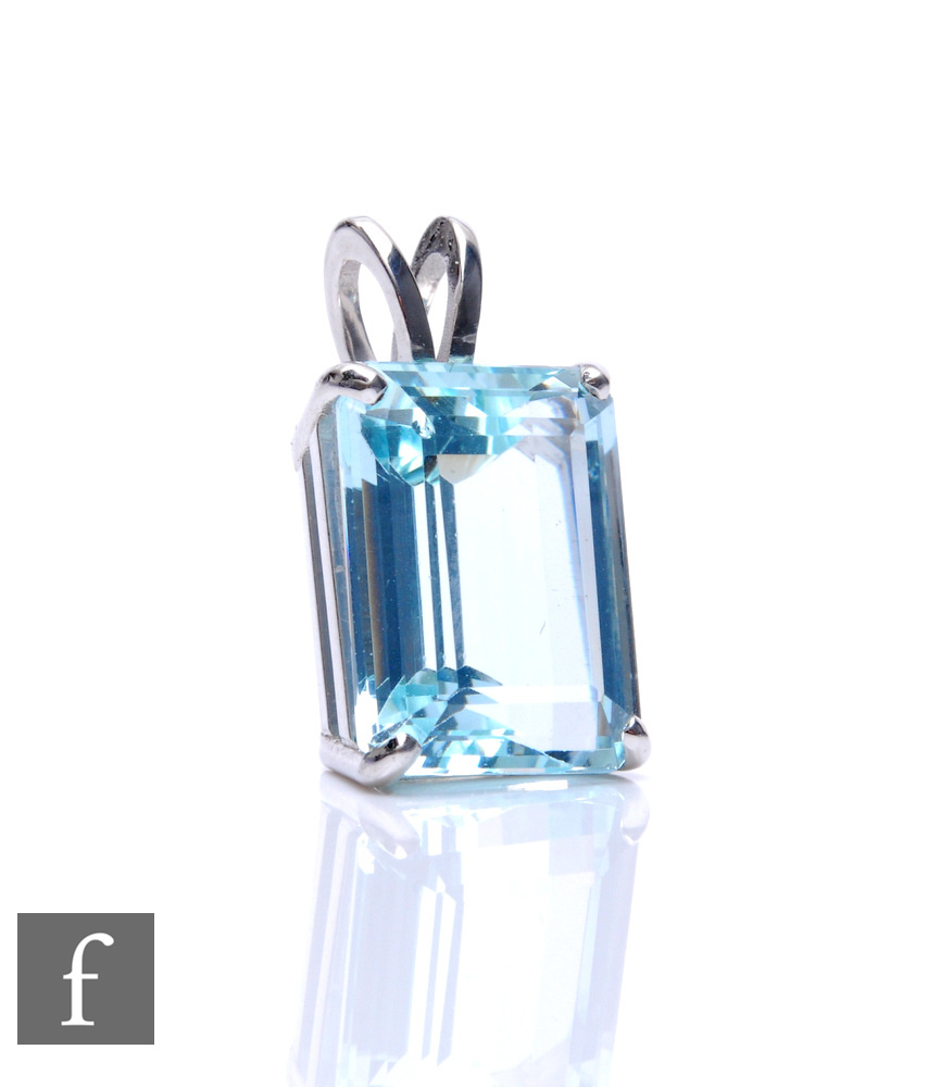 A 9ct hallmarked white gold single stone aquamarine pendant, weight 11.5ct, claw set to below a