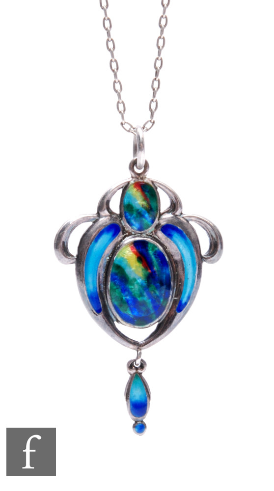 A hallmarked silver Art Nouveau pendant with blue/green and yellow enamel decoration, suspended from