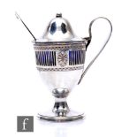 A hallmarked silver pedestal mustard pot and cover with pierced sides and loop handle, Chester 1904,
