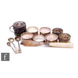 A small parcel lot of assorted hallmarked silver items to include a set of four napkin rings, a