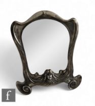 An Art Nouveau Orivit polished pewter easel mirror with a central portrait of a maiden to lower