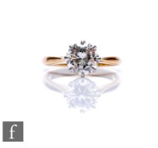 An 18ct hallmarked diamond solitaire ring, brilliant cut claw set diamond, weight approximately 1.