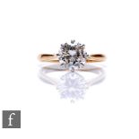 An 18ct hallmarked diamond solitaire ring, brilliant cut claw set diamond, weight approximately 1.