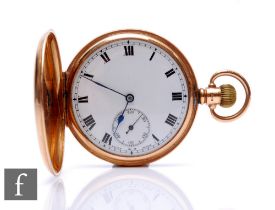 A 9ct hallmarked, crown wind, full hunter pocket watch, Roman numerals to a white enamelled dial,