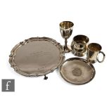 A small parcel lot of hallmarked silver items to include a salver, a small tankard, a dish with