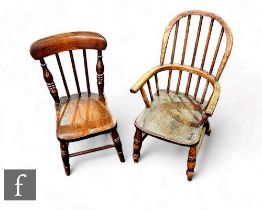 A late 19th to early 20th century Windsor hoop back ash and elm elbow chair and a similar standard