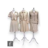 Three 1960s vintage two piece suits, comprising a Maidmoiselle cream polyester mini dress with